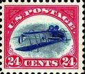 24 cent red U.S. stamp with biplane.